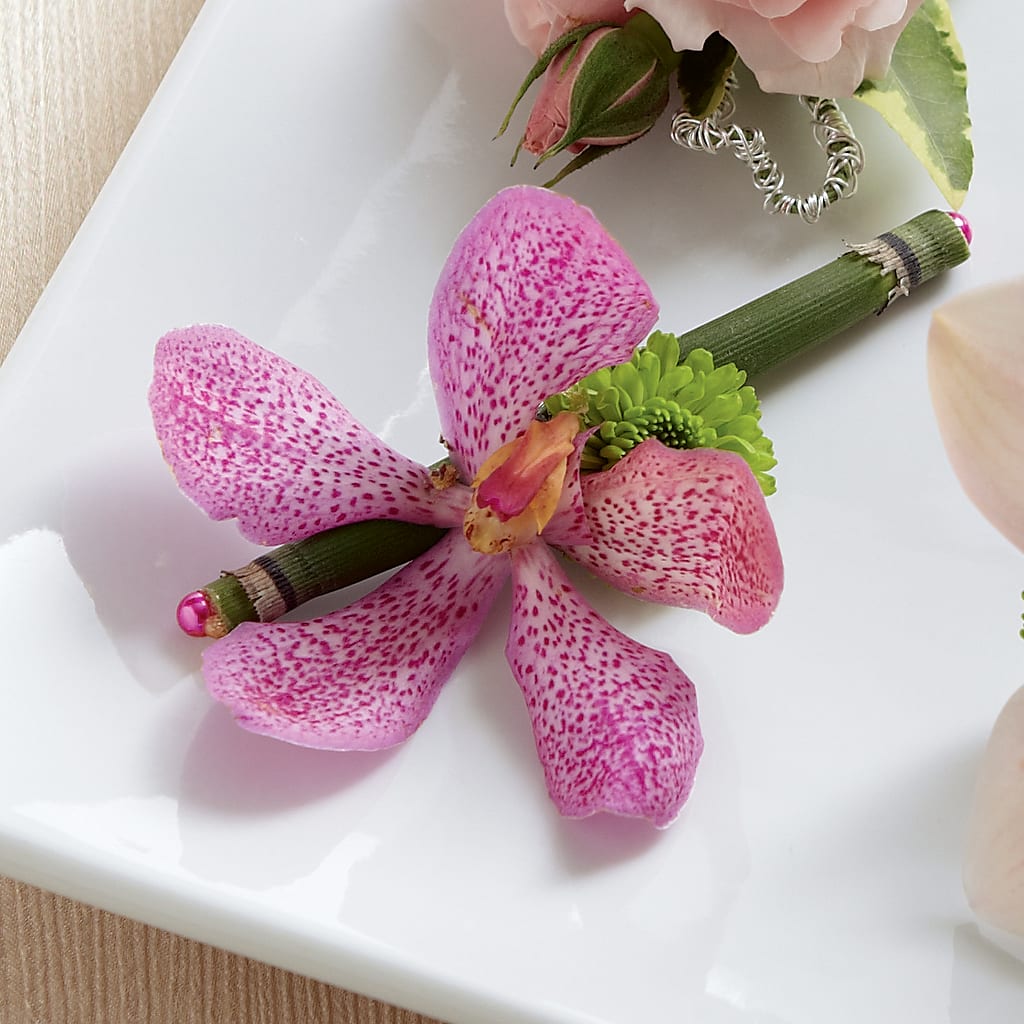 Pink Mokara Boutonniere –  Magical Flowers, Naples FL